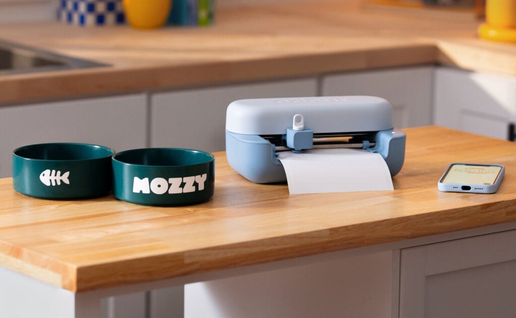 Cricut Joy 2 compact cutting machine from the new Cricut machines 2026 collection creating vinyl labels on a kitchen counter