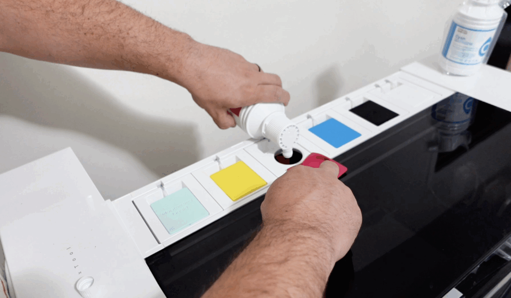 filling ink tanks in xTool apparel printer during setup process