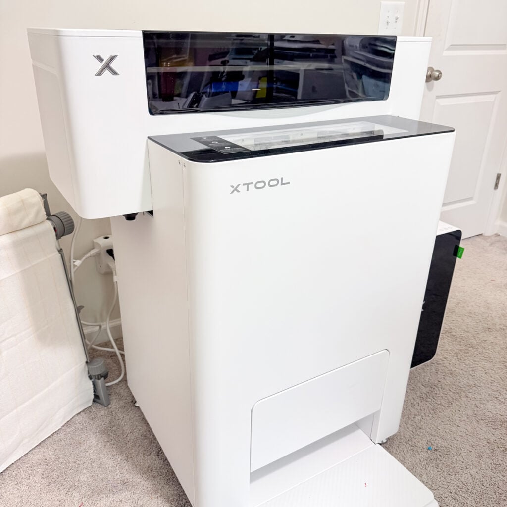 full xTool apparel printer setup with shaker oven in home craft space