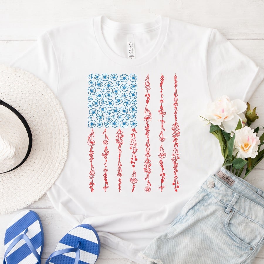 White t-shirt mockup featuring a floral American flag SVG design.