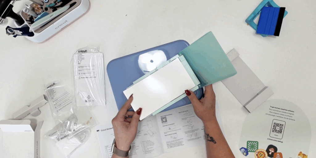 Loading sticker paper into Cricut StickerPix Print + Cut material tray